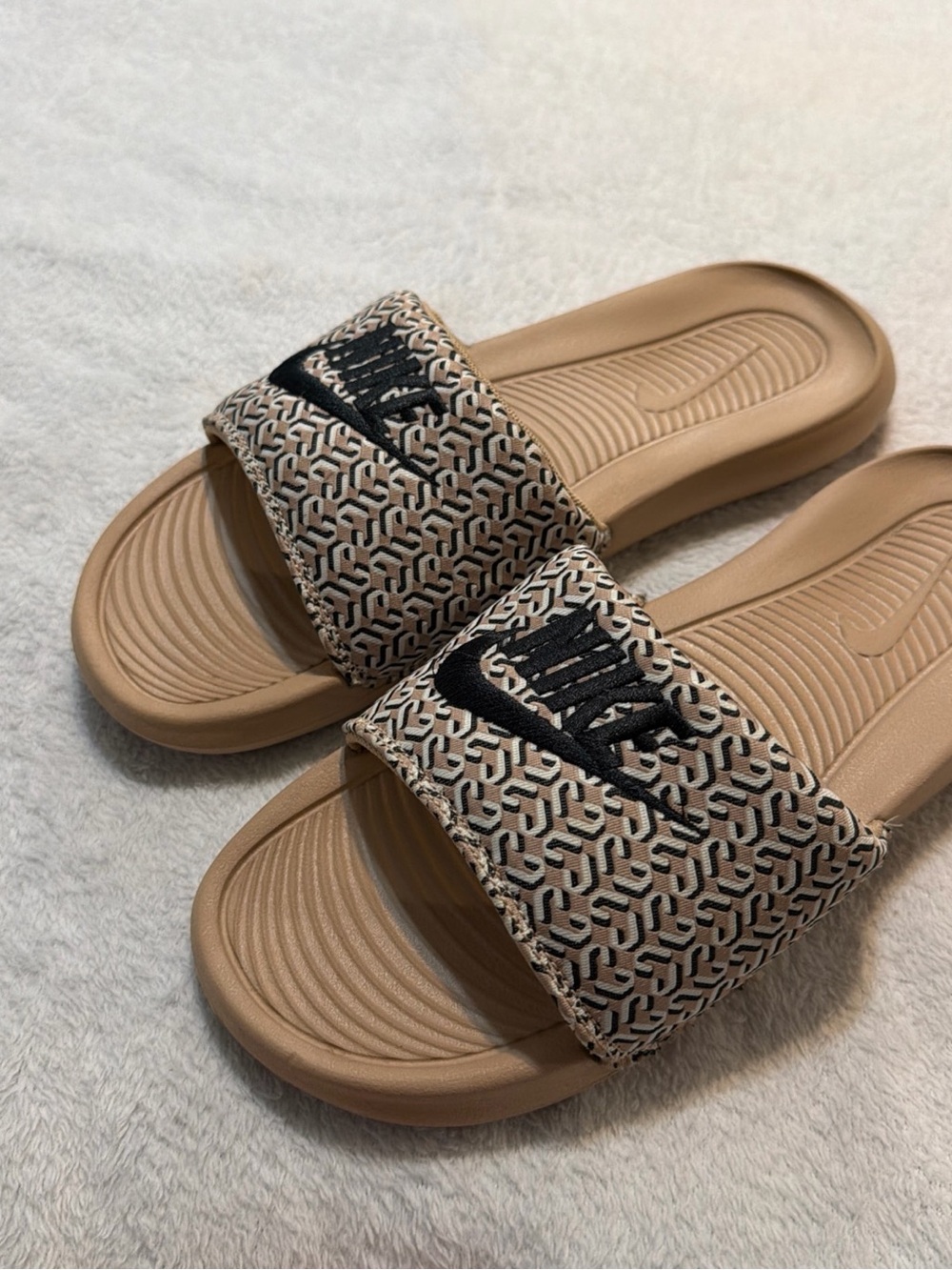 Nike Women's Tan Slide Sandals with Black Logo